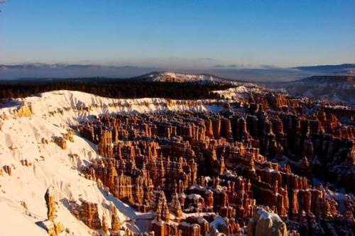 The first glimpses of the morning sun illuminate rock formations at Inspiration Point in Bryce Canyon National Park, Utah, on Thursday, Dec. 24.