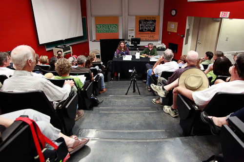 Mort Rosenblum, professor, journalist and author, speaks to a packed crowd. Photograph by JOHN DE DIOS © 2011